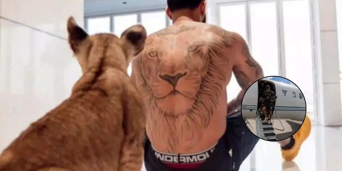 Memphis Depay com um filhote de leão